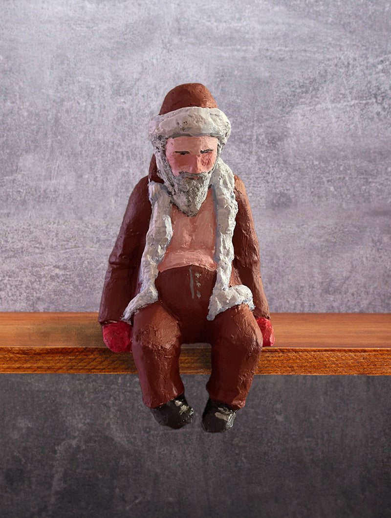 Nisse som sitter på kanten