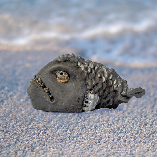 Steinbit skulptur- sur