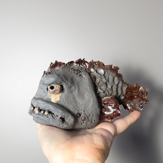 Steinbit skulptur-trist SOLGT