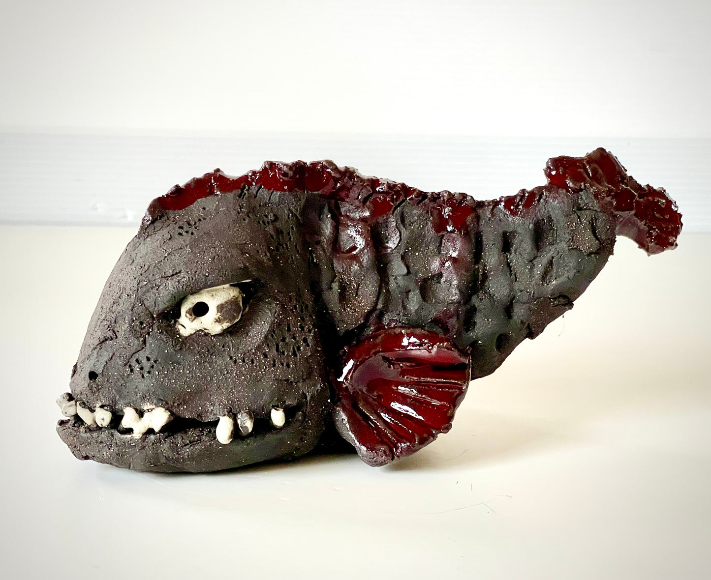 Steinbit skulptur- Luring