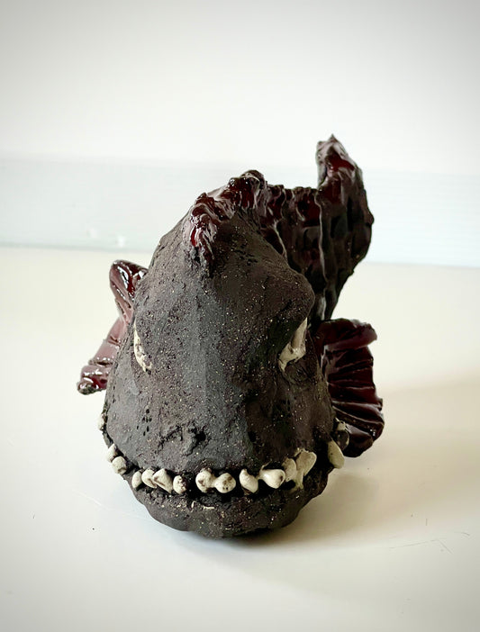 Steinbit skulptur- Luring