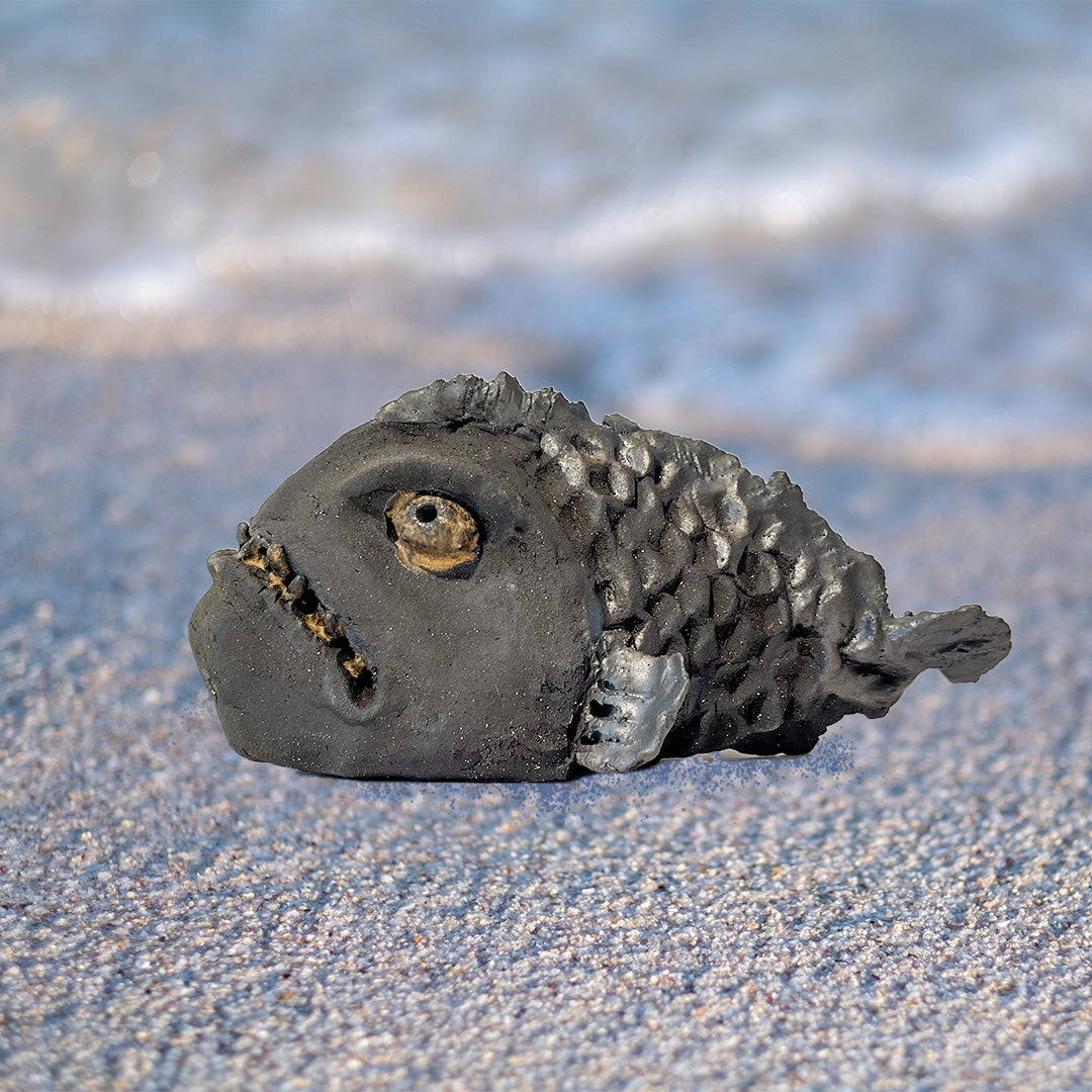 Steinbit skulptur- sur